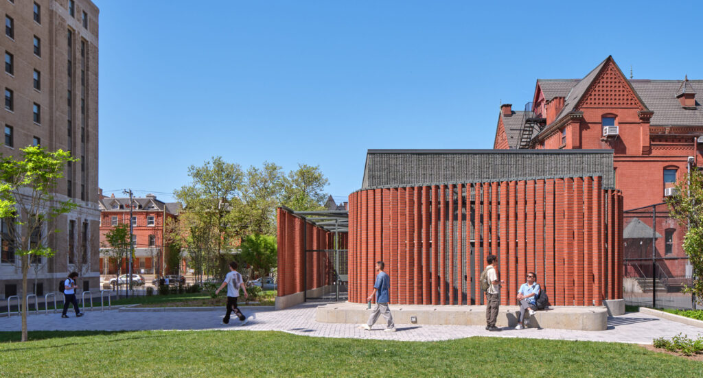 image of Drexel Myers Switchgear building with students on front lawn
